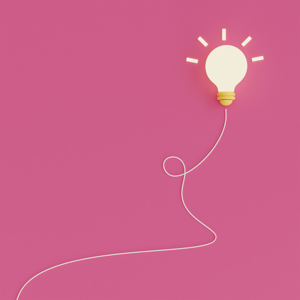 light bulb on pink background